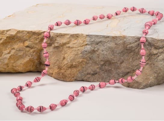 Beads laid out for crafting at the women's workshop