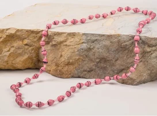 Beads laid out for crafting at the women's workshop