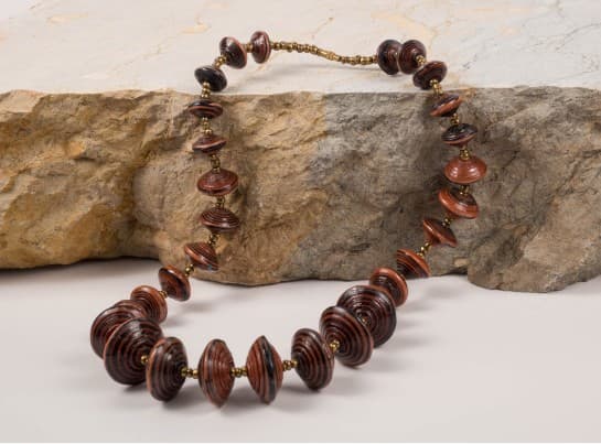 Handmade bead necklaces displayed at the workshop